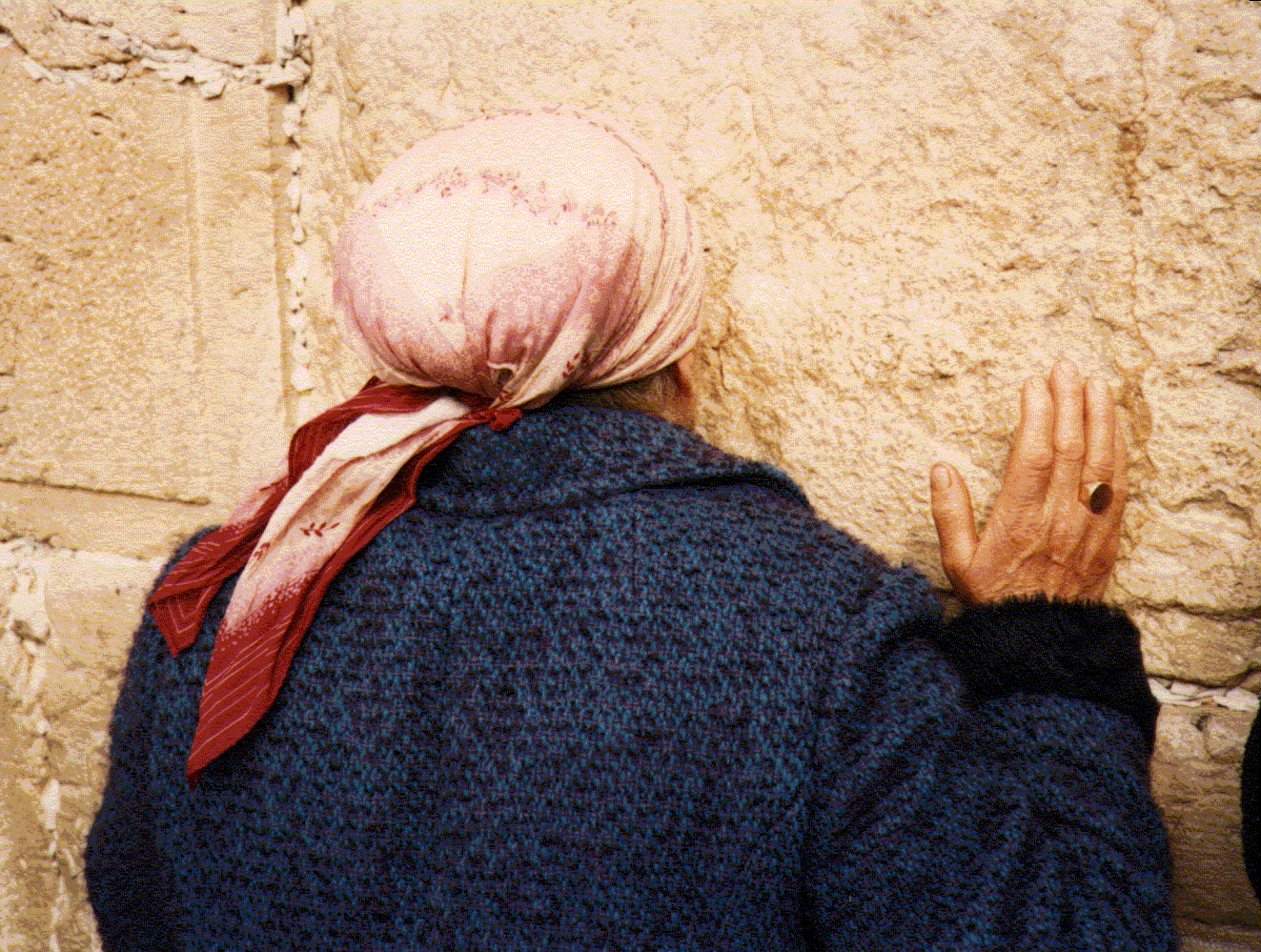 Woman at the Wailing Wall in Jerusalem